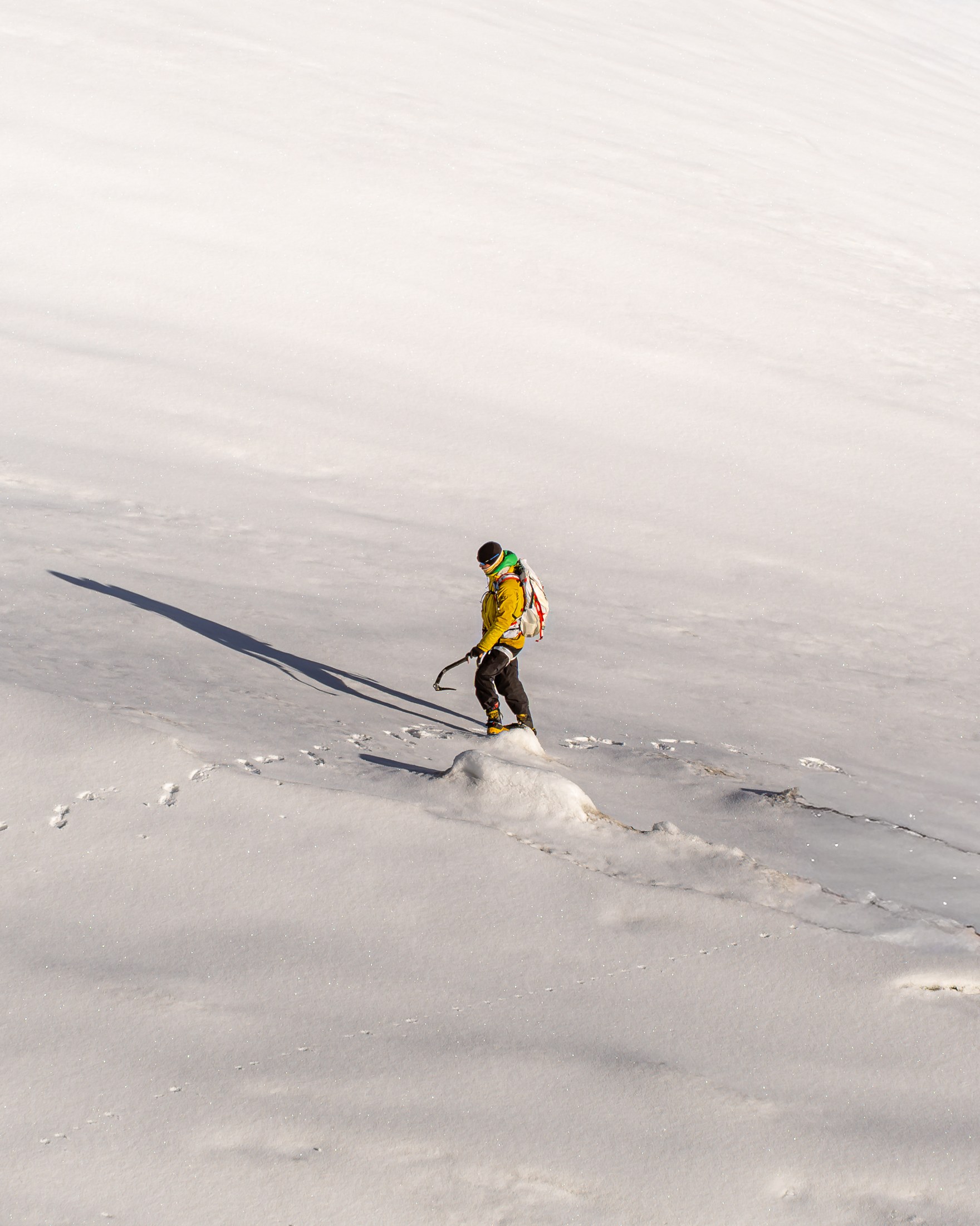 A climber crossing snow on Kaigar Ri, photographed for White Expedition